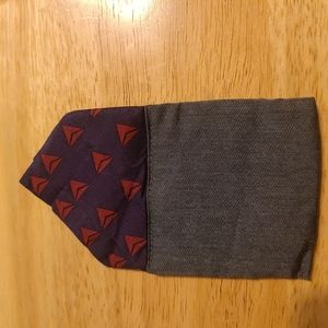 Delta branded pocket puff
